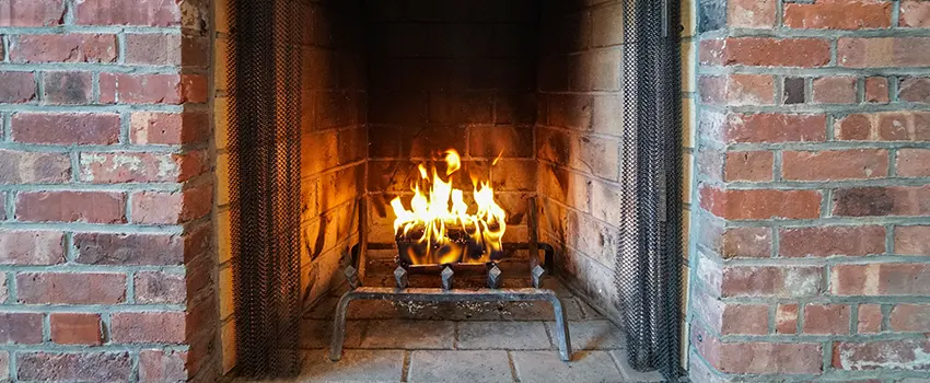 Repairing Damaged Fireplace Tiles in Mastic, New York