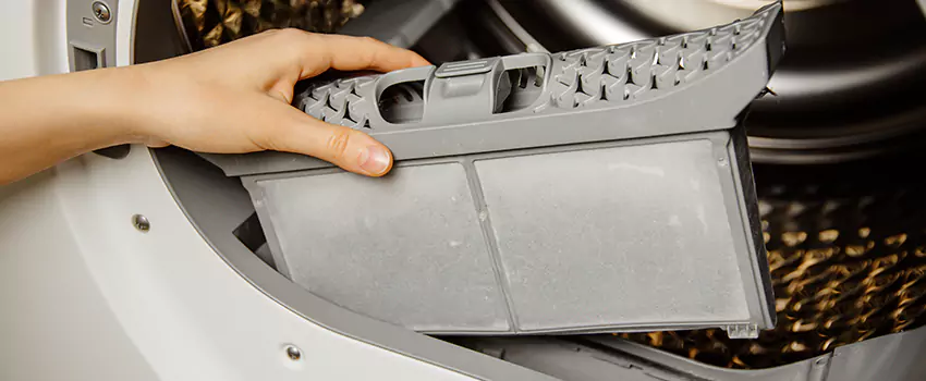 Signs Of A Clogged Dryer Lint Trap in Mastic, New York